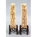 A VERY GOOD PAIR OF 18TH CENTURY CHINESE CARVED IVORY WRIST RESTS - EIGHT IMMORTALS, the rests