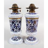 A GOOD PAIR OF BLUE AND WHITE QAJAR GLASS HOOKAH LAMP BASES, 30cm high.