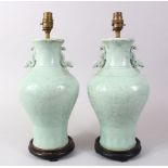 A GOOD PAIR OF 19TH / 20TH CENTURY CHINESE CELADON PORCELAIN VASES / LAMPS, the vases with tin