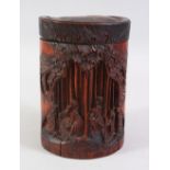 A 19TH / 20TH CENTURY CHINESE CARVED BAMBOO BRUSH POT AND COVER, carved with figures amongst