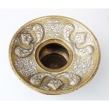 A FINE LATE 19TH CENTURY ISLAMIC DAMASCUS BRASS BASIN, inlaid with silver calligraphy, 32cm