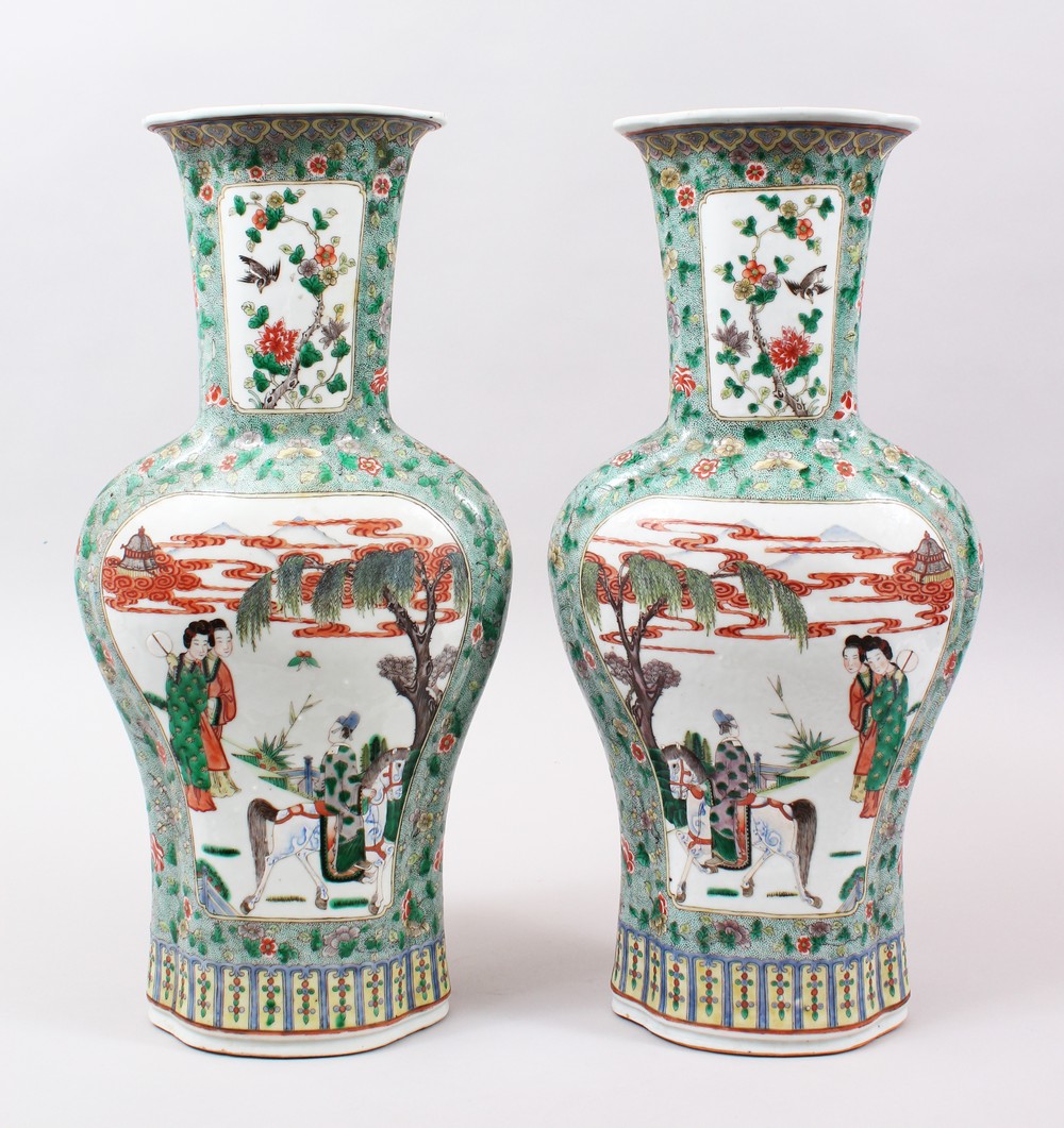 A GOOD PAIR OF 19TH CENTURY CHINESE FAMILLE VERT PORCELAIN VASES, the body of the vases decorated