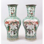 A GOOD PAIR OF 19TH CENTURY CHINESE FAMILLE VERT PORCELAIN VASES, the body of the vases decorated