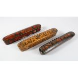 A COLLECTION OF THREE PERSIAN QALAMDAN LACQUER PEN BOXES, 22.5cm ,23cm & 22cm