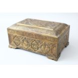 A FINE PERSIAN ISLAMIC BRASS CASKET, with engraved panels of figures and birds within engraved