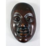 A GOOD JAPANESE MEIJI PERIOD BRONZE MASK OF OKAME, 20cm high