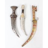 THREE VARIOUS ISLAMIC DAGGERS, various sizes, (3)