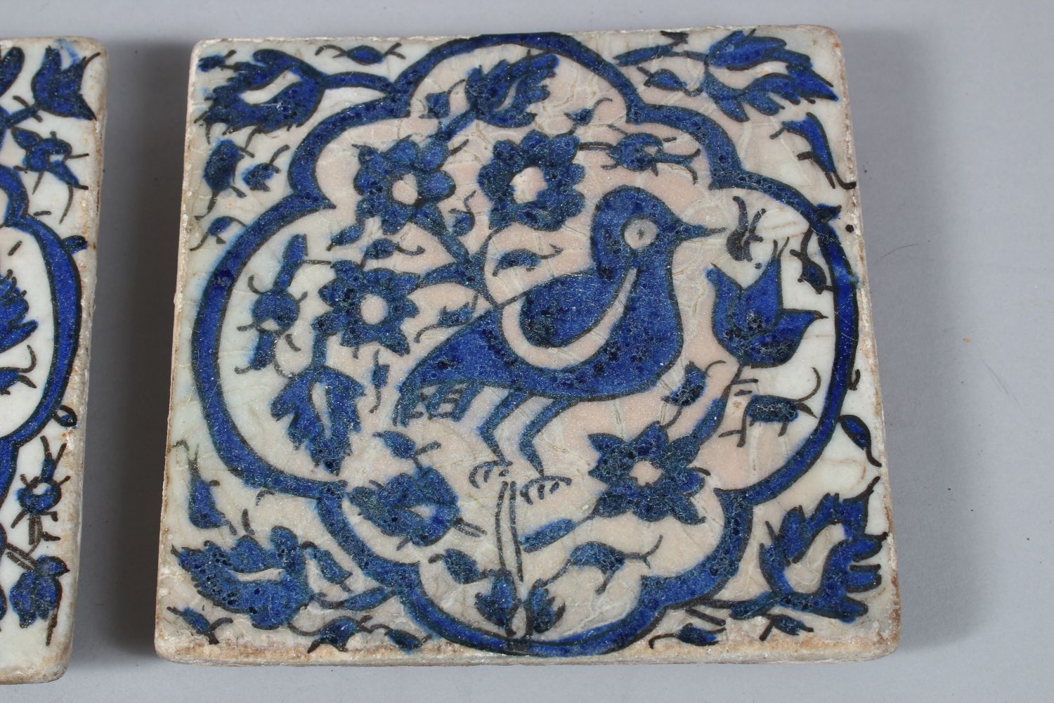 THREE 18TH/19TH CENTURY PERSIAN TILES, each decorated with birds amongst foliage, 15.5cm x 15.5cm - Image 3 of 5