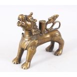 A FINE 15TH - 17TH CENTURY TIBETAN BRONZE FIGURE OF A LION / INCENSE, stood in a striking pose, 11cm