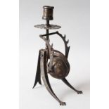 A GOOD KOFTGARI STEEL AND GOLD INLAID DESK STAND, in the form of a stylised animal, 22cm high.