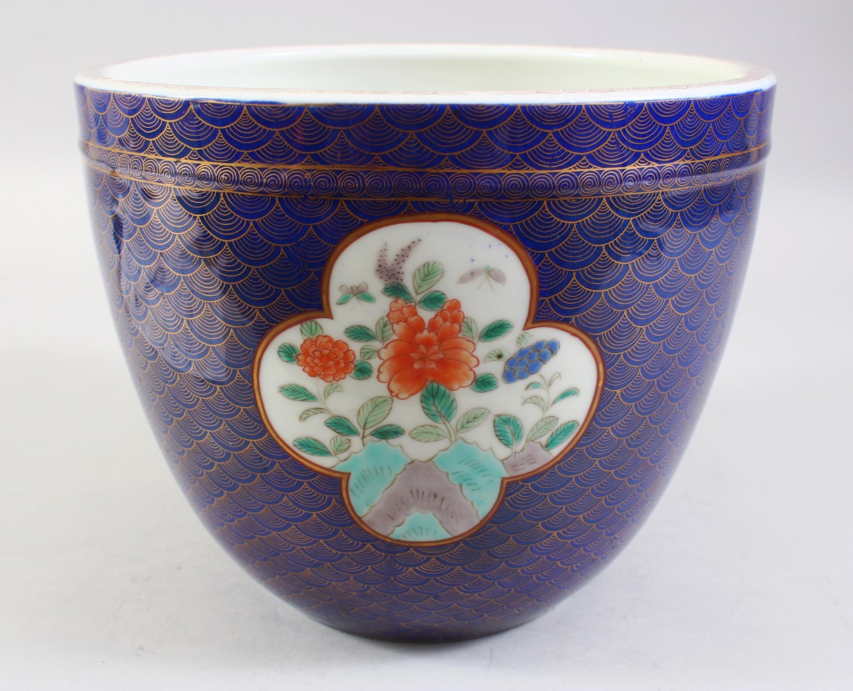 A JAPANESE MEIJI PERIOD POWDER BLUE & GILT DECORATION PORCELAIN JARDINIERE / POT, with panels of