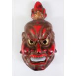 A GOOD JAPANESE MEIJI PERIOD CARVED AND PAINTED WOOD NOH MASK, of the demon Washibana akuji (