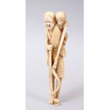A GOOD JAPANESE MEIJI PERIOD CARVED IVORY OKIMONO , the figure with long legs holding a staff,