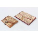 TWO OTTOMAN SILVER THREAD DECORATED LEATHER WALLETS, one dated 1908, 14cm and 10cm wide, (2).