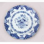 A GOOD 18TH CENTURY QIANLONG CHINESE BLUE & WHITE PORCELAIN PLATE, the plate decorated with a native