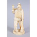 A JAPANESE MEIJI PERIOD CARVED IVORY OKIMONO OF A FISHERMAN, the man stood holding his net, with one