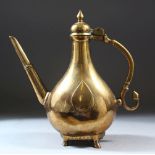 A VERY GOOD INDIAN BRONZE EWER, with engraved decoration on four feet, 28cm high.