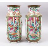 A PAIR OF 19TH CENTURY CHINESE CANTON FAMILLE ROSE PORCELAIN VASES / LAMPS, the bodys of the vases