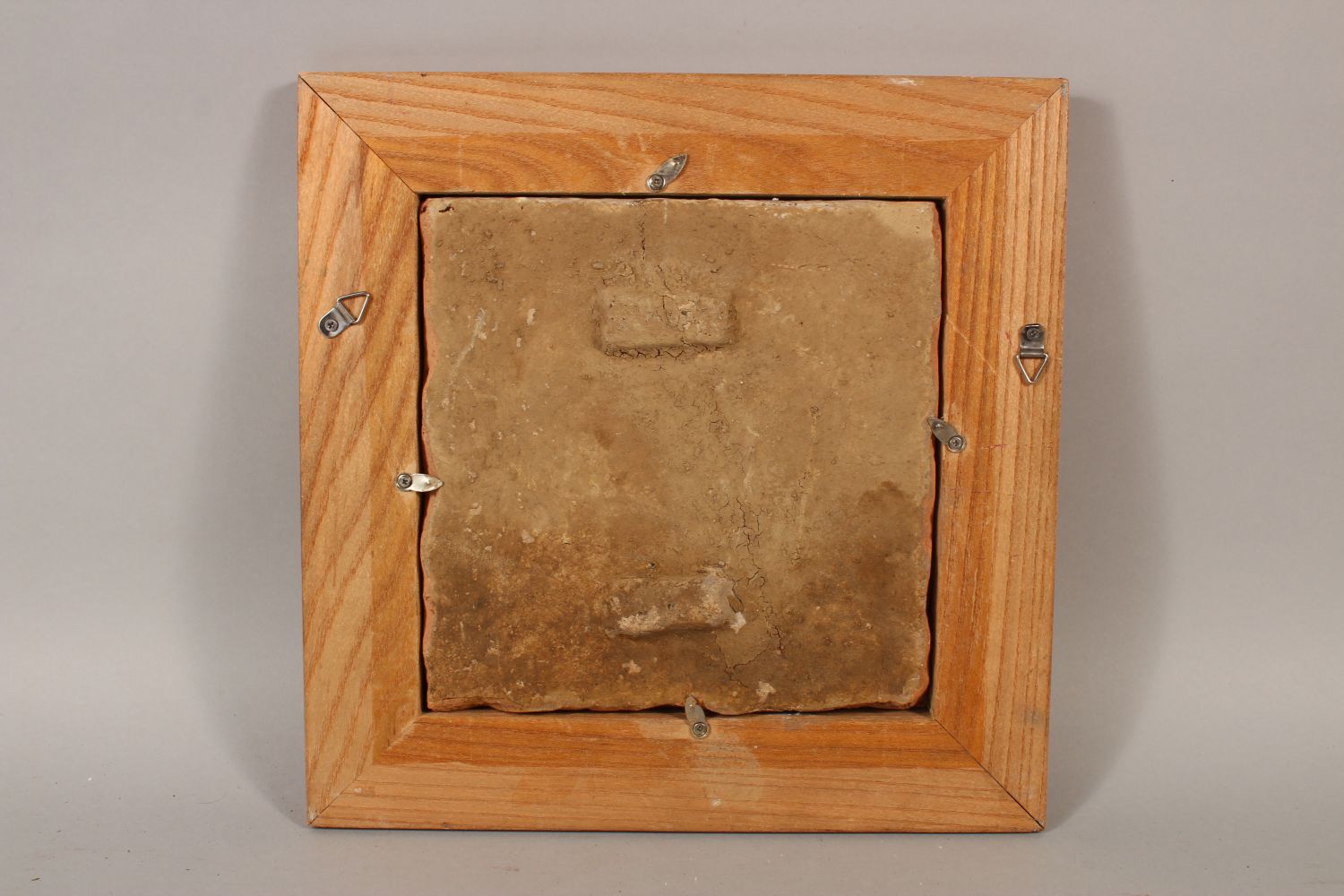 A FINE QAJAR CERAMIC SQUARE TILE, depicting a seated Ruler and Attendants, Framed 18cm x 18cm. - Image 3 of 3