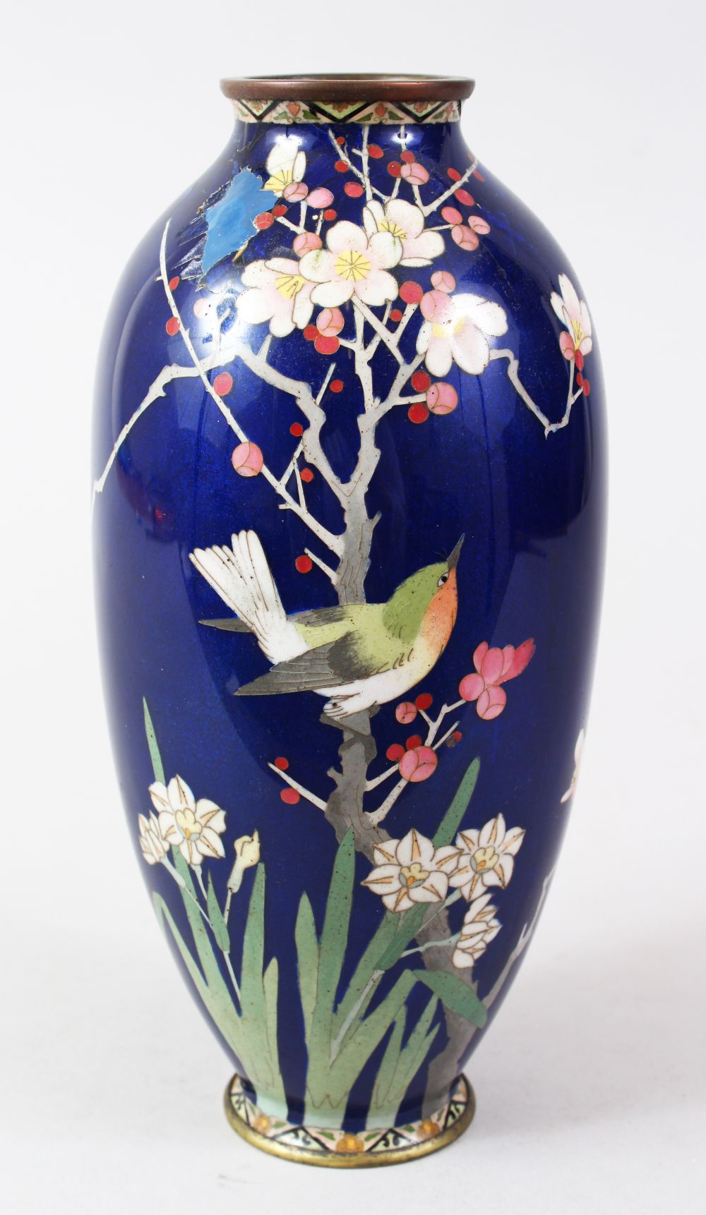 A JAPANESE MEIJI PERIOD CLOISONNE VASE, the rich blue ground with decoration of a bird amongst