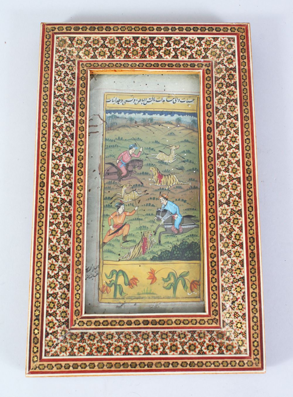 INDIAN SCHOOL, A HUNTING PARTY, WATERCOLOUR, in a decorative inlaid frame, image: 19cm x 8.5cm.