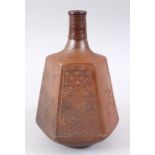 AN UNUSUAL JAPANESE MID - LATE EDO PERIOD STONEWARE SAKE BOTTLE, the bottle of hexagonal form with