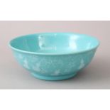 A LOVELY CHINESE PEACOCK BLUE GROUND BOWL, the body with carved decoration of double gourds and
