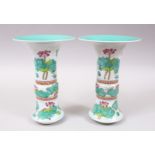A GOOD PAIR OF CHINESE FLARED RIM PORCELAIN DOUCAI VASES, the body decorated with scenes of lotus