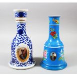 TWO QAJAR CERAMIC HUQQA BASES, both with oval portraits, 26cm and 23cm high.