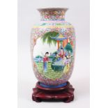 A GOOD 19TH / 20TH CENTURY CHINESE FAMILLE ROSE PORCELAIN LANTERN VASE, decorated with panels of