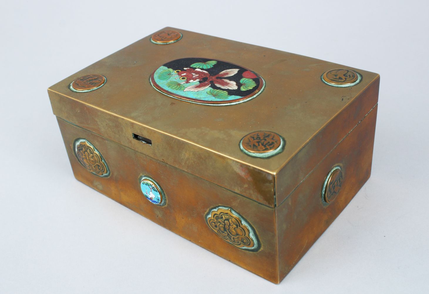 A GOOD 19TH / 20TH CENTURY CHINESE BRASS & CLOISONNE ENAMEL HINGED BOX, the top with a cloisonne