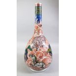 A GOOD 19TH CENTURY CHINESE FAMILLE ROSE PORCELAIN VASE, the body of the vase with an iron red