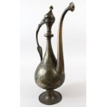A GOOD SAFAVID BRONZE EWER AND COVER, with engraved decoration, 47cm high.
