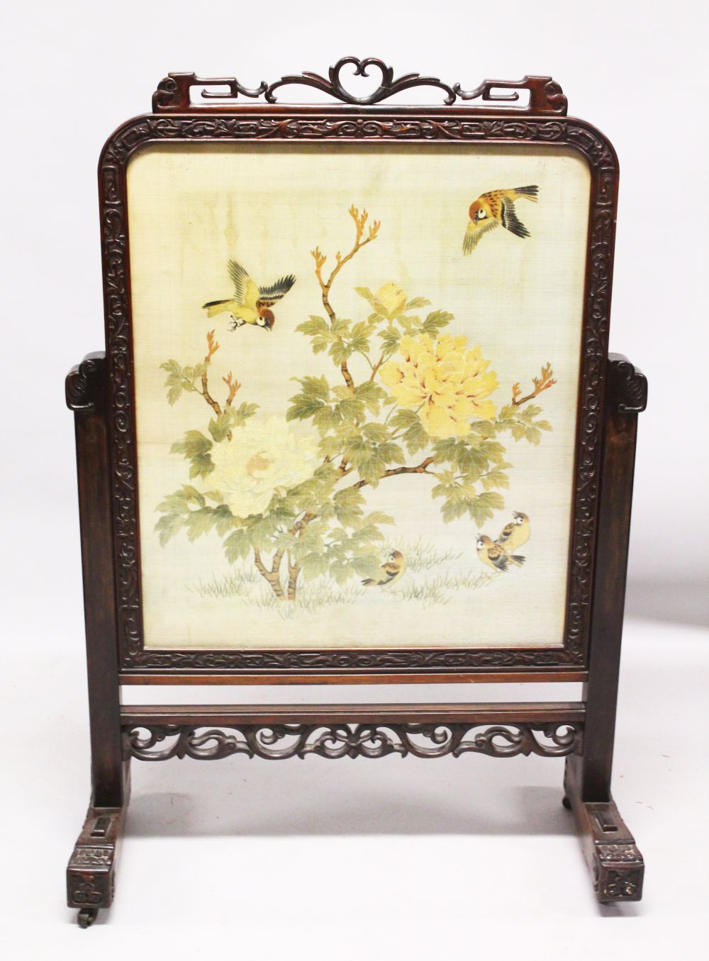 A GOOD 19TH CENTURY CHINESE CARVED HARD WOOD SILK SCREEN PANEL, the hardwood housing carved,