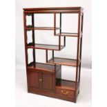 A GOOD 20TH CENTURY CHINESE HARDWOOD ROOM DIVIDER, with an arrangement of open shelves and a pair of