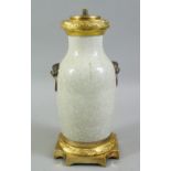 A 20TH CENTURY CHINESE CRACKLE GLAZED PORCELAIN VASE, with moulded lion mask & ring handles, and