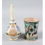 TWO POSSIBLY TURKISH POTTERY ITEMS, consisting of a vase 19cm high, and a cup 10.5cm high x 8cm