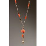 AN INDIAN CORAL AND WHITE METAL NECKLACE, 90CM LONG.
