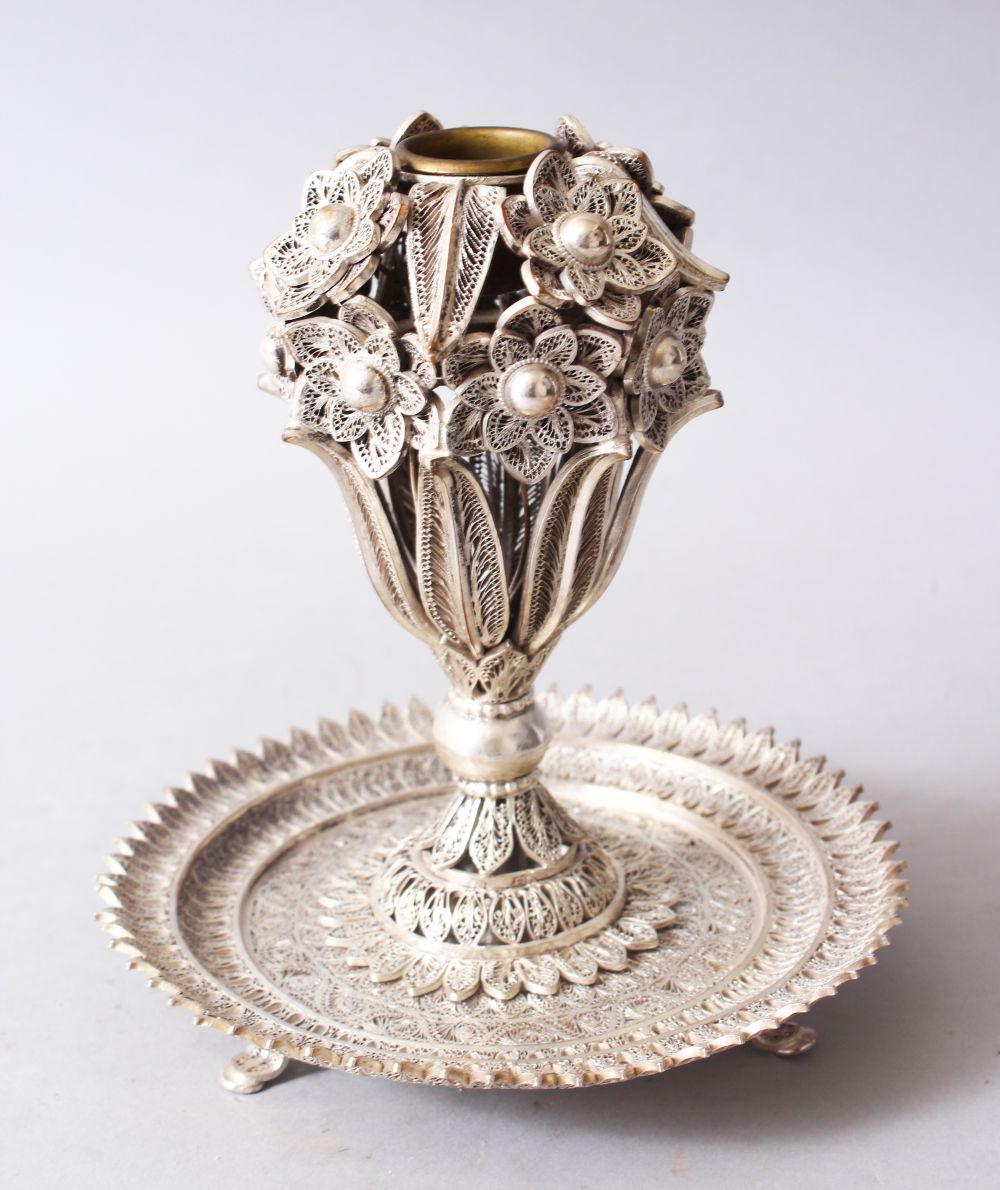 A FINE INDIAN FILIGREE WHITE METAL INCENSE BURNER, the burner formed of floral display, 15.5cm