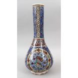 A GOOD QAJAR POTTERY BOTTLE VASE, painted with panels of birds and flowers, 36cm high.