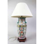 A 19TH / 20TH CENTURY CHINESE FAMILLE ROSE PORCELAIN VASE / LAMP, the body of the vase decorated