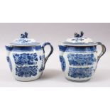 A GOOD PAIR OF 18TH CENTURY CHINESE BLUE & WHITE PORCELAIN JUG & COVERS, the jugs decorated with