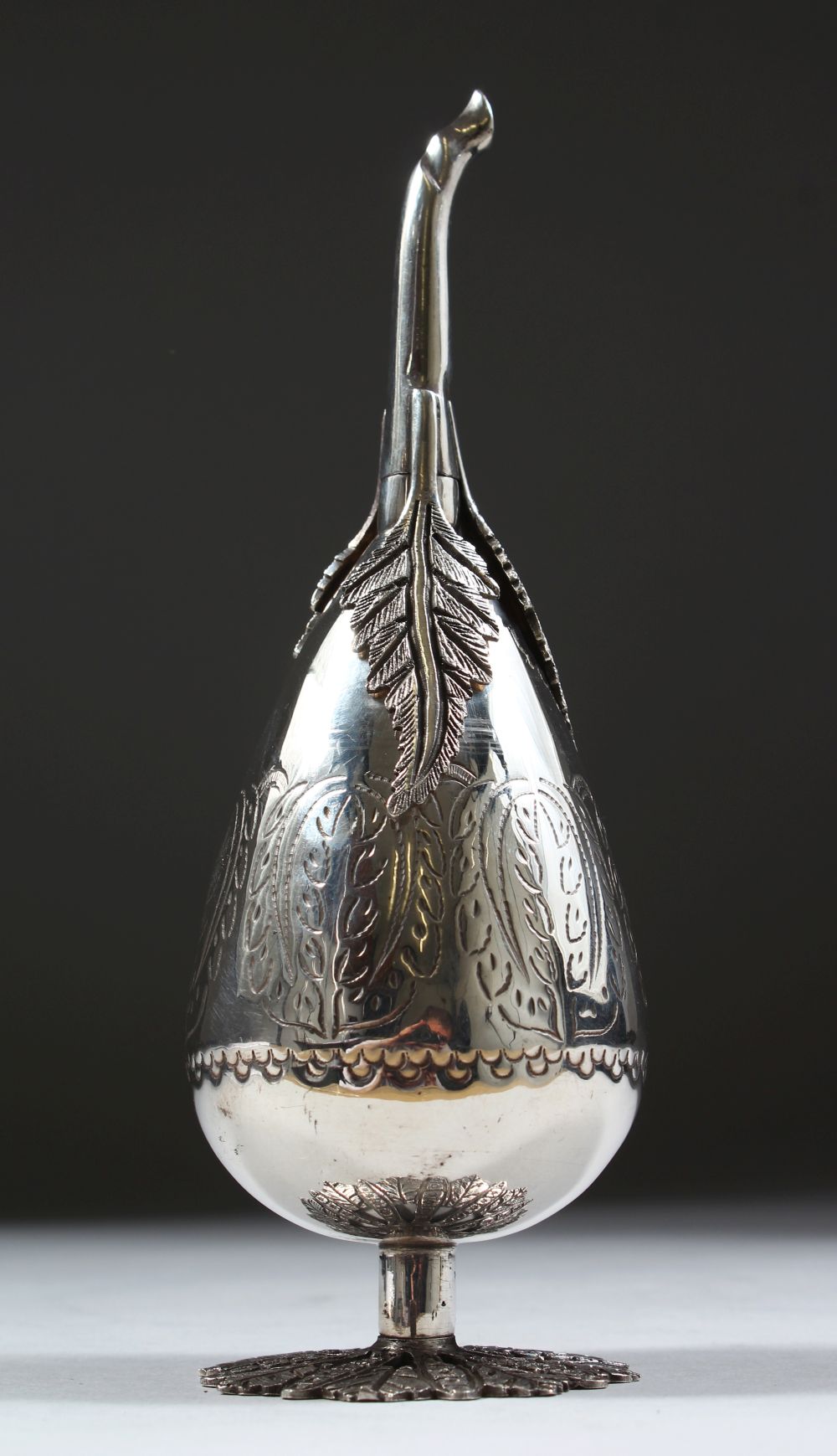 A GOOD TURKISH SOLID SILVER ROSE WATER SPRINKLER, with moulded leaf decoration, 19cm high.