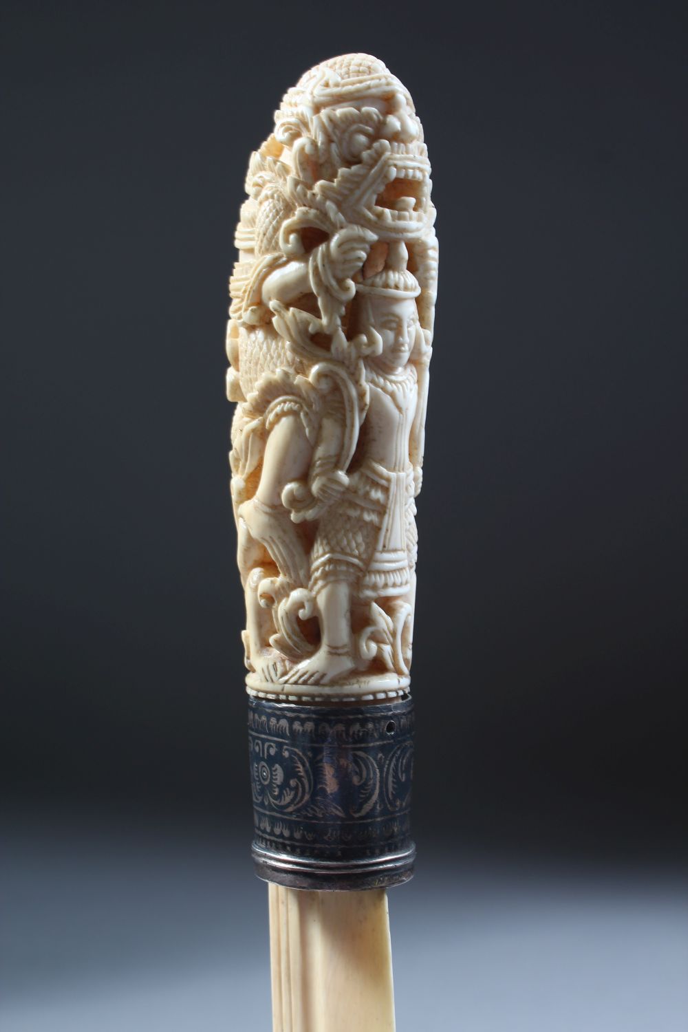 A GOOD 19TH CENTURY BURMESE IVORY PAGE TURNER, with a well carved handle and Niello Silver collar, - Image 2 of 4