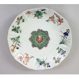 A GOOD CHINESE KANGXI PERIOD FAMILLE VERTE PORCELAIN DISH, the dish simply decorated with sprays