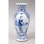 A 19TH CENTURY CHINESE KANGXI STYLE BLUE & WHITE PORCELAIN BALUSTER VASE, the body with scenes of