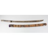 A 19TH CENTURY NIELLO INLAID SILVER HILTED BURMESE DHA SWORD, with fine silver inlaid blade and