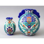 TWO SIMILAR FRENCH CERAMIC VASES, for the Islamic market, with blue and red enamel decoration,