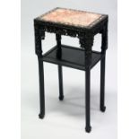 A 19TH CENTURY CHINESE HARDWOOD MARBLE TOP TWO TIER STAND, the stand with carved and inlaid mother