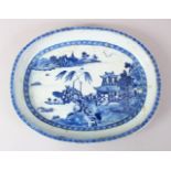 A 19TH CENTURY CHINESE BLUE & WHITE OVAL PORCELAIN DISH, the dish decorated ith scenes of lanscapes,